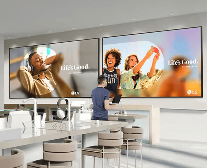 Commercial digital display showing branded content in a modern retail or corporate space