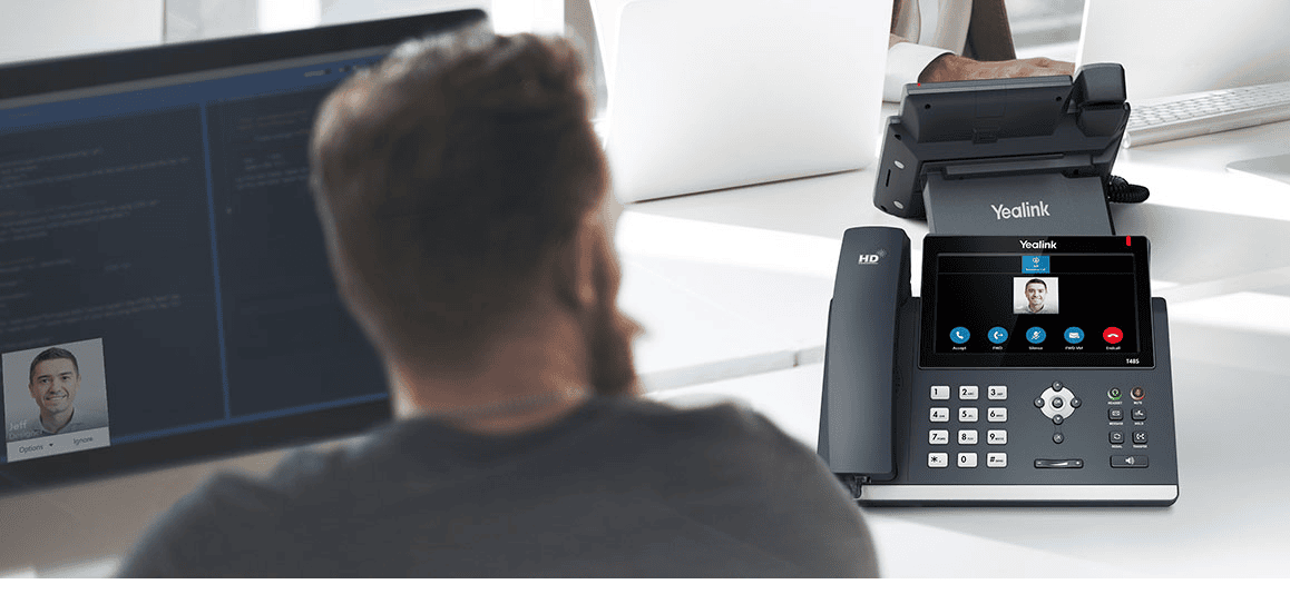 IT manager planning Yealink device rollout across Australian offices